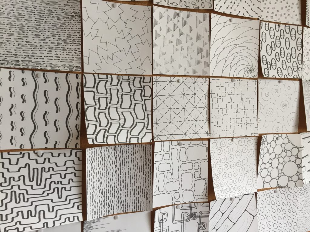 Pen drawings on square paper